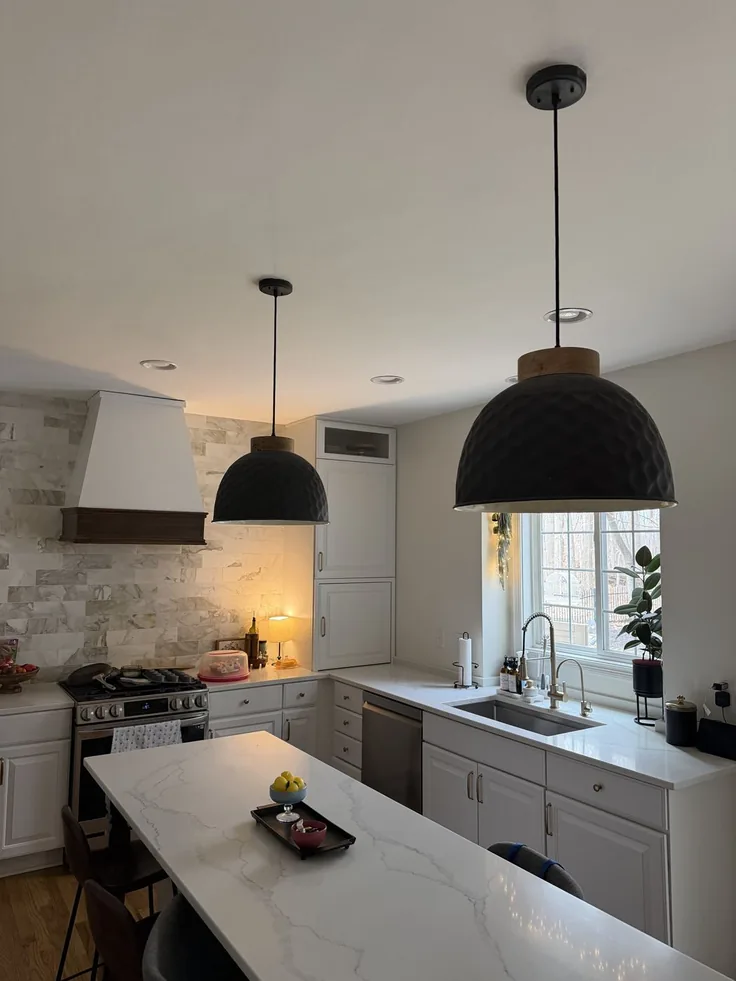Pendant lighting installed over a kitchen island